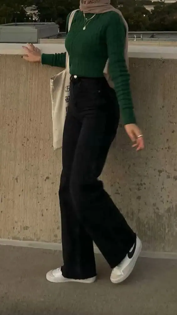 Green Sweater With Black Flared Jeans
