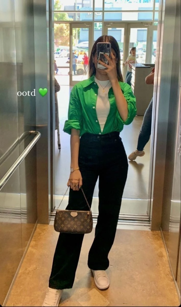 Vibrant Green Shirt With Black Jeans
