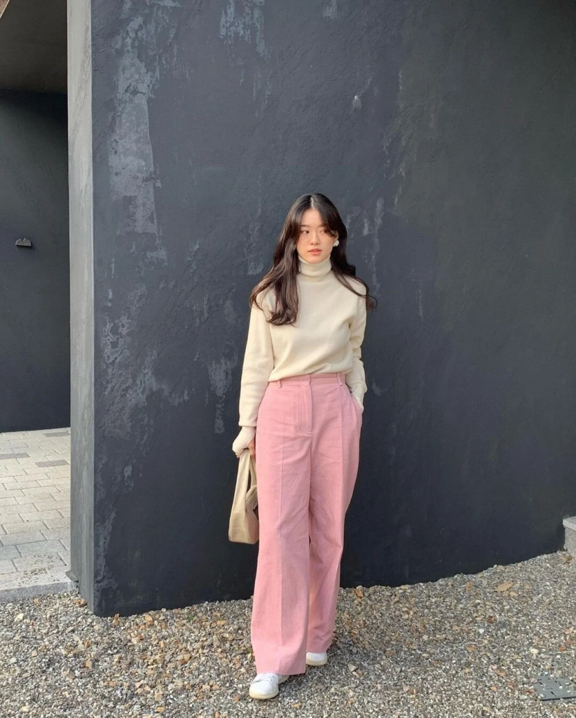 Cream Turtleneck with Pink Trousers
