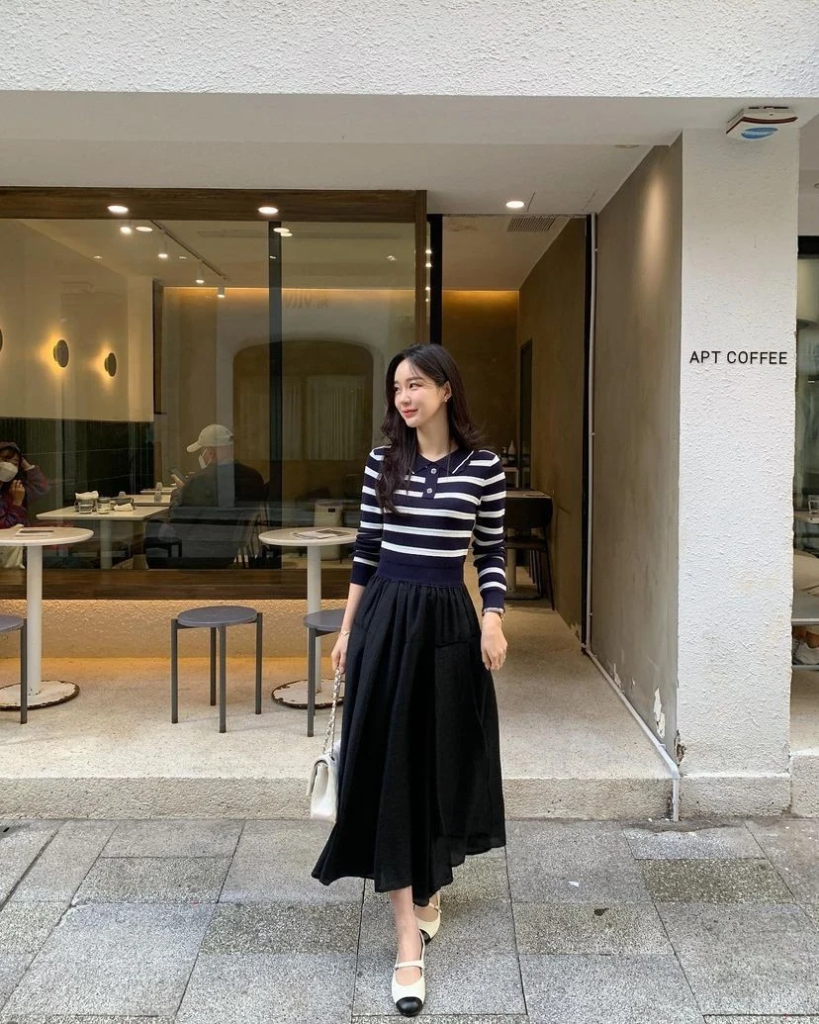 Striped Top with Elegant Black Skirt
