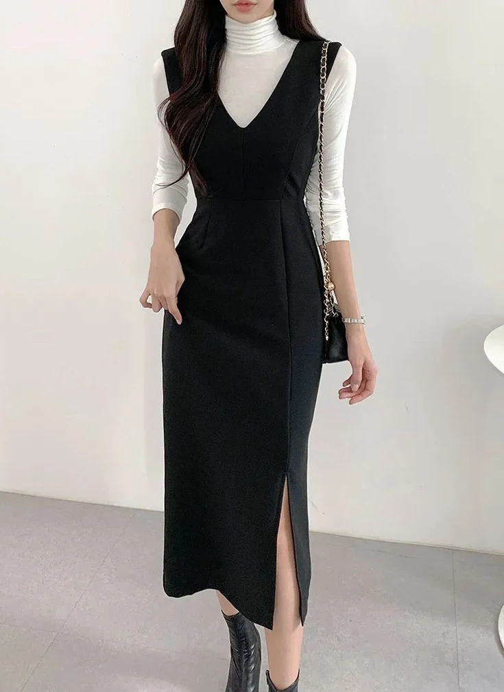 Sleek Black Vest Over Turtleneck