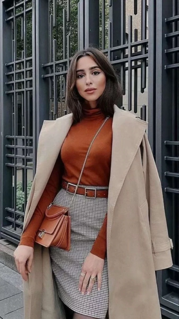 Camel Coat With Rust Turtleneck
