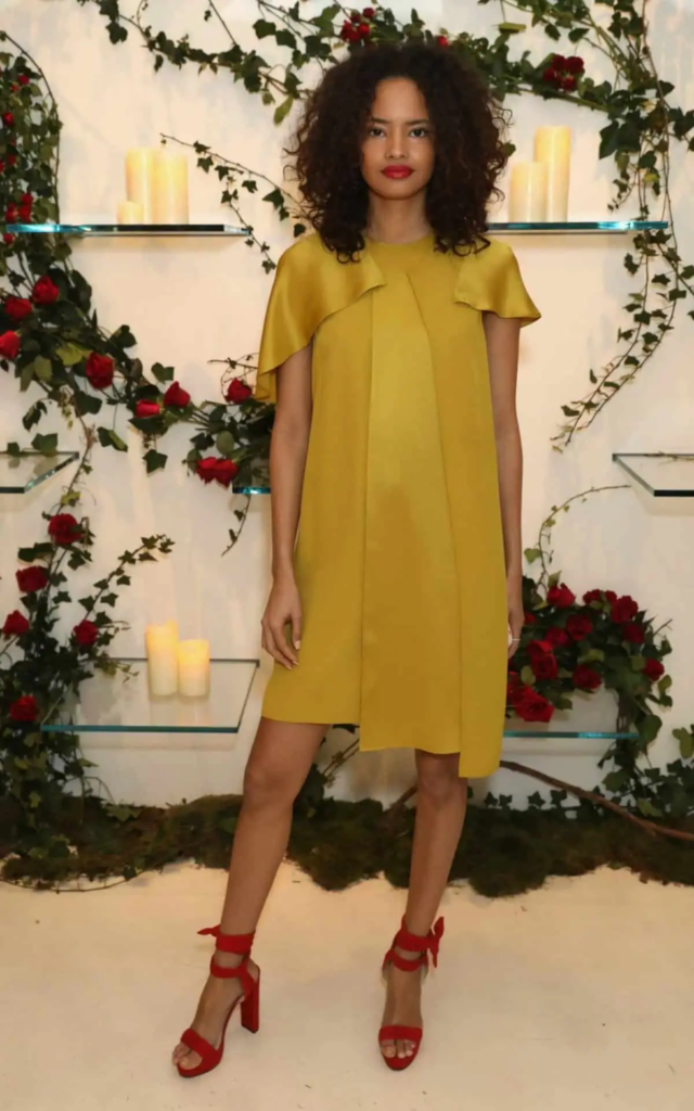 Mustard Cape Dress with Red Accents
