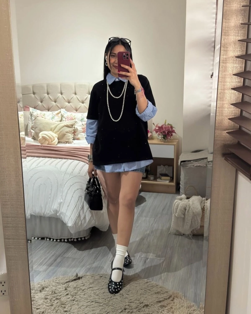 Black Vest Over Striped Shirt Look