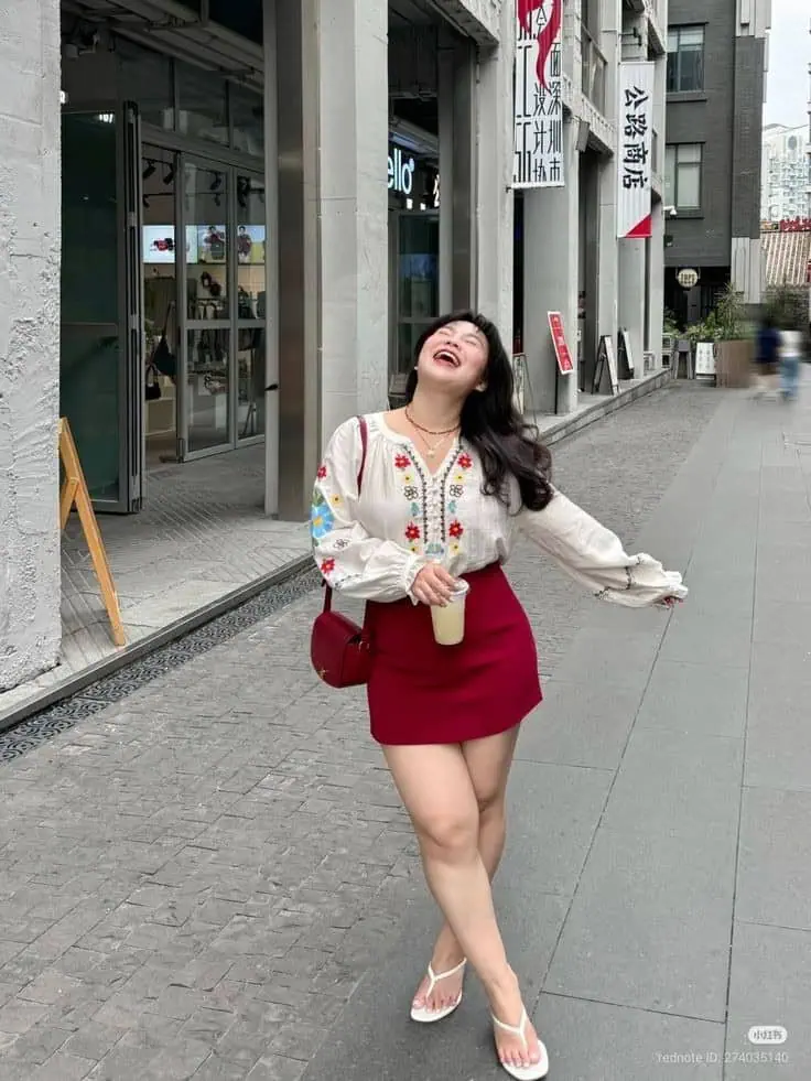 Embroidered Blouse with Burgundy Mini Skirt
