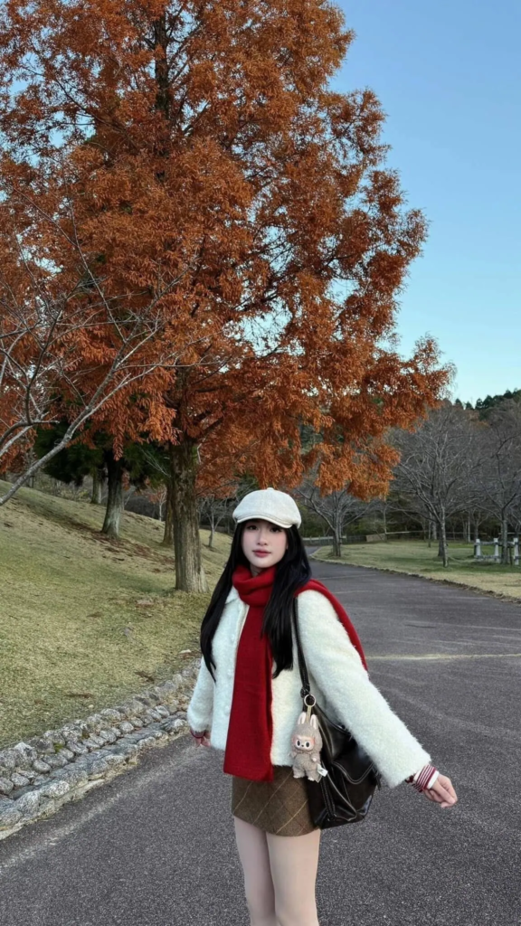 Cream Cardigan with Bold Red Scarf