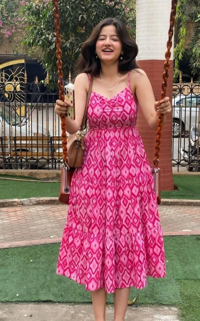 Pink Patterned Midi Dress with Vintage Charm
