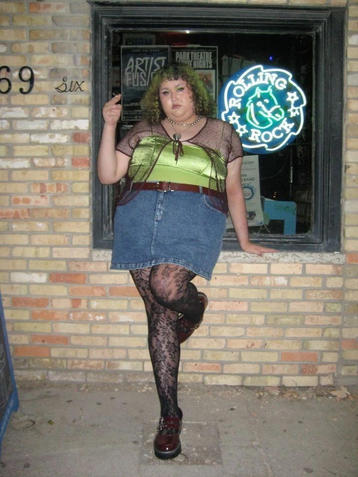 Edgy Graphic Tee with Denim Skirt