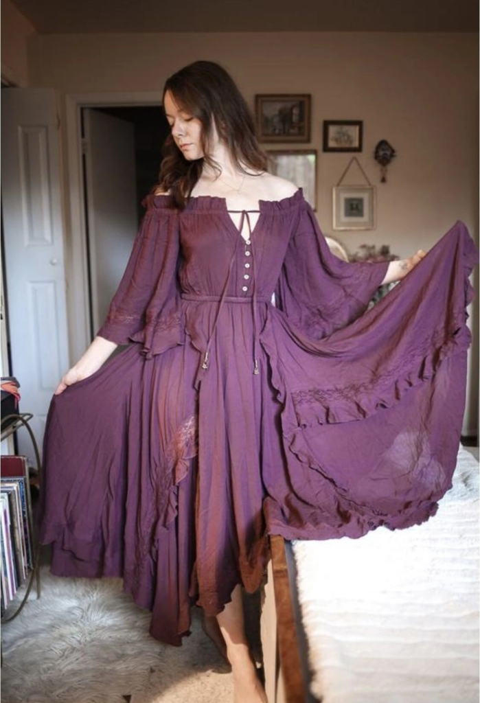 Flowing Purple Dress with Romantic Details
