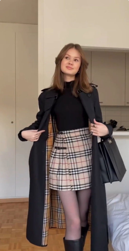 Classic Plaid Skirt with Sleek Black Coat
