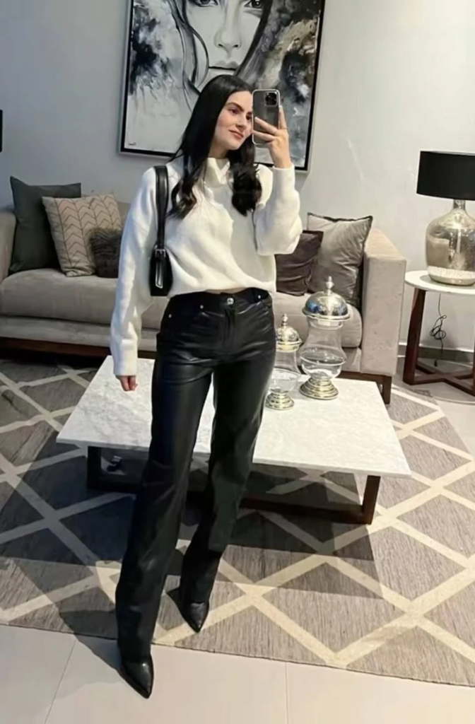 Cream Sweater with Black Leather Pants
