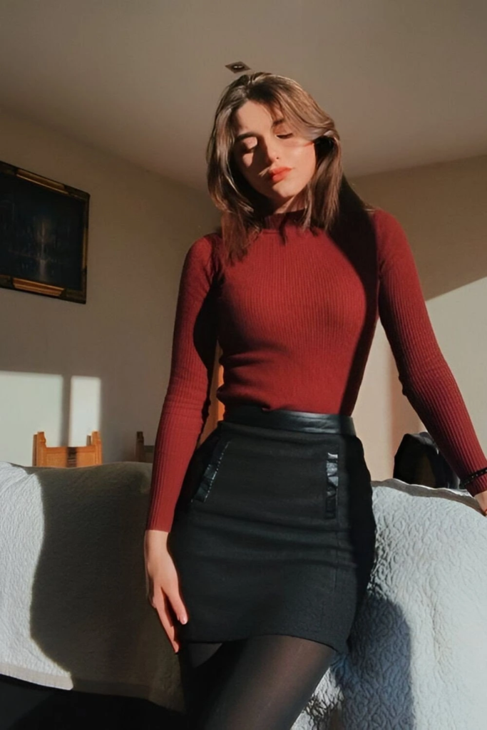 Burgundy Ribbed Top with Black Leather Skirt
