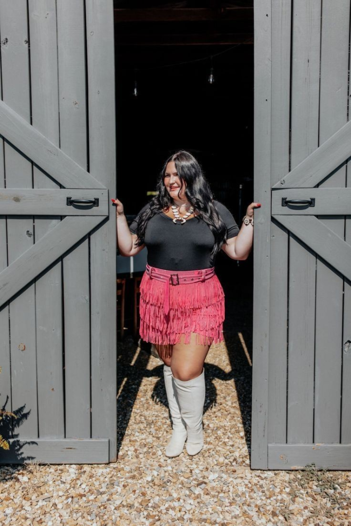 6. Fringed Jacket with Turquoise Boots