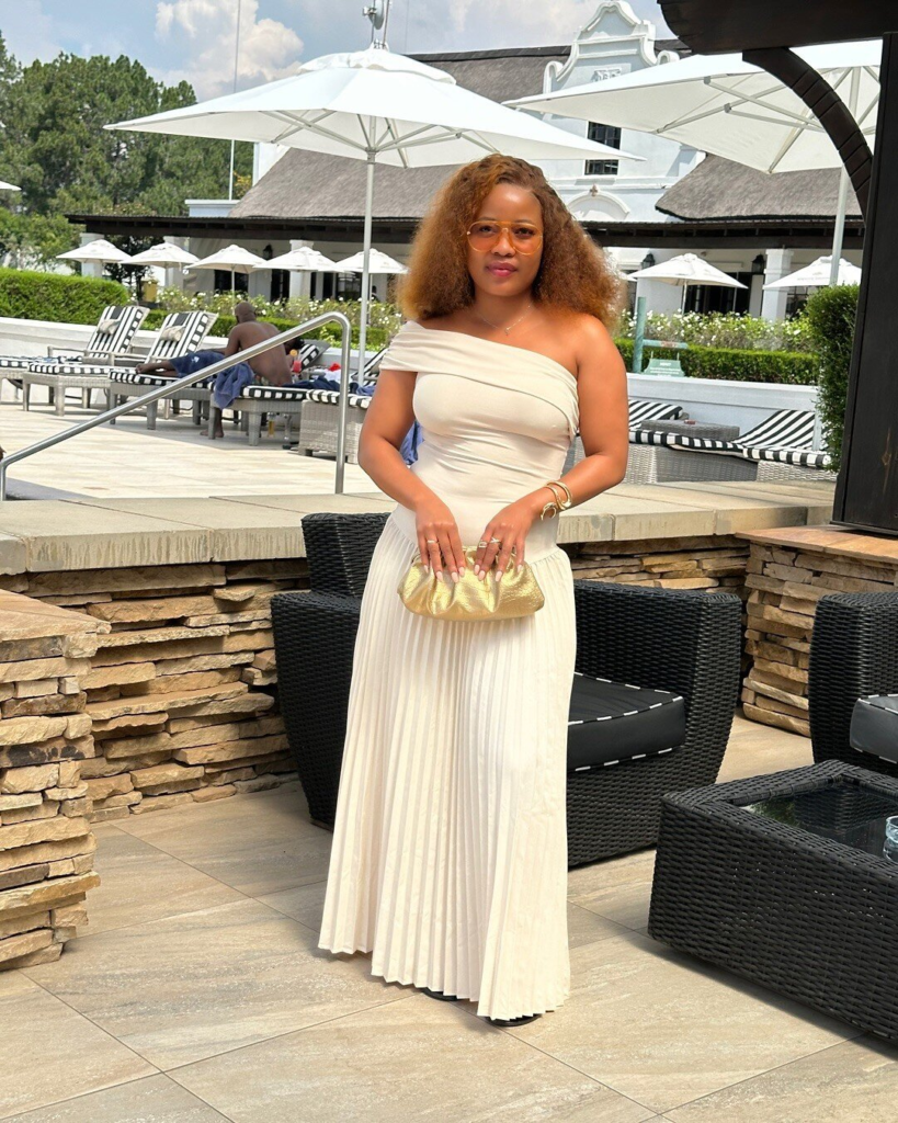 One-Shoulder Elegance with Pleated Skirt