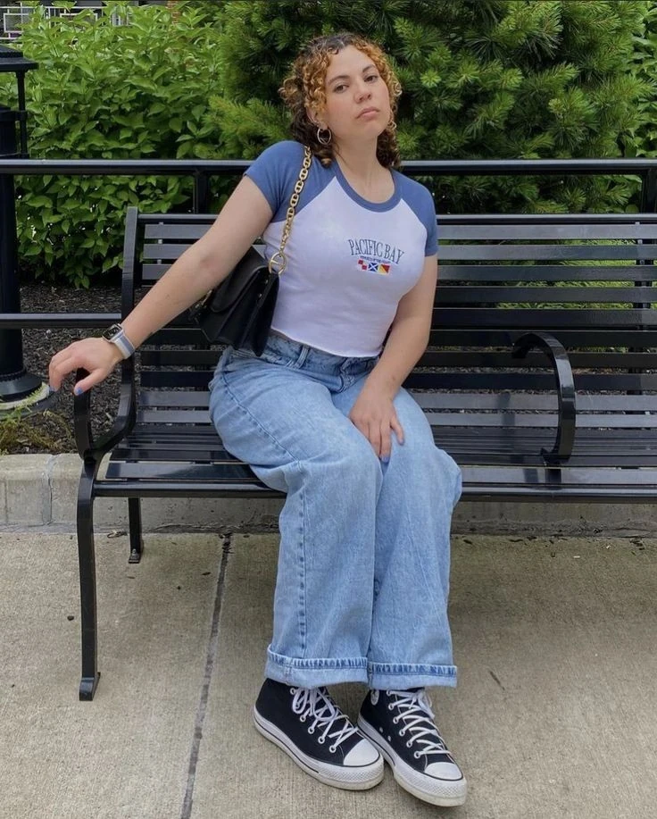 Sleek White Jumpsuit with Statement Necklace